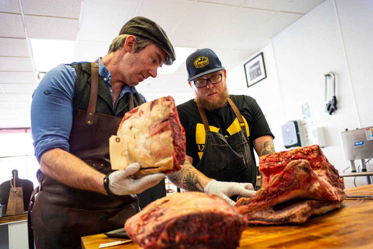 Martin Kirrane, owner and butcher at Featherblade Craft Butchery, left, trains apprentice Jimmy ...