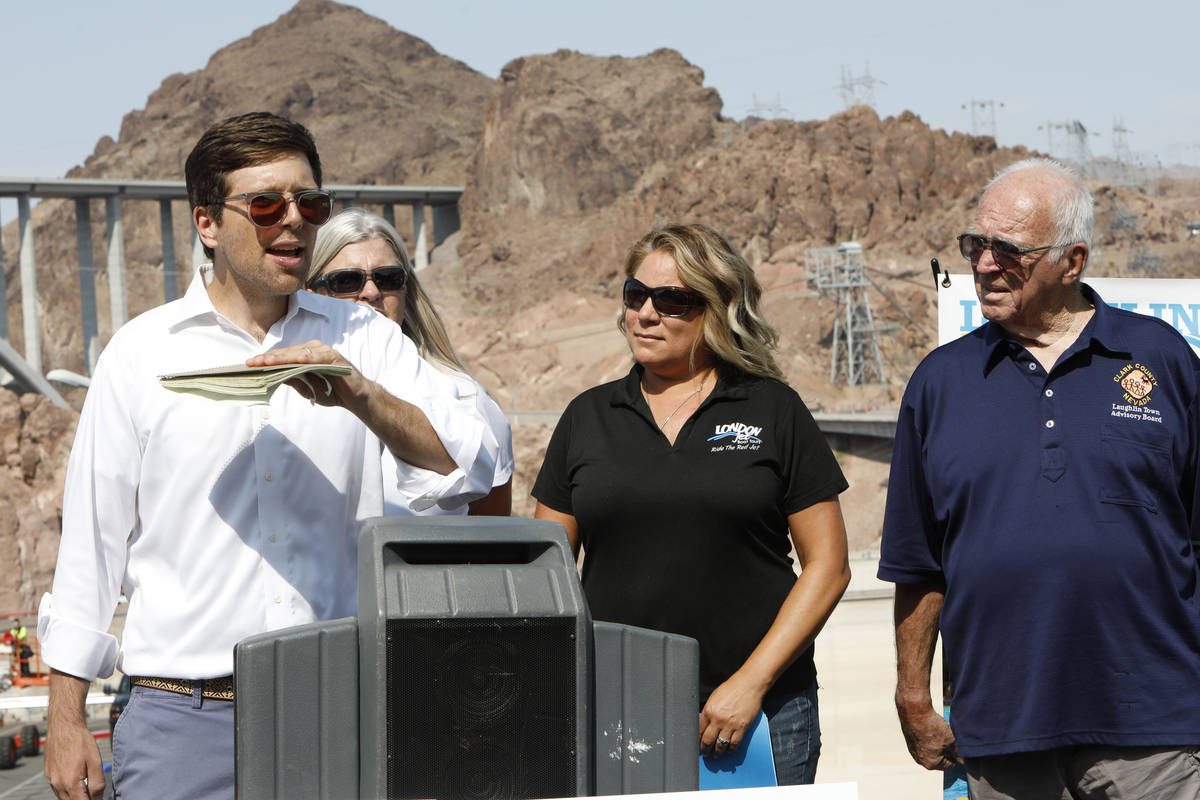 Kyle Roerink, executive director of Great Basin Water Network, left, speaks during a news confe ...