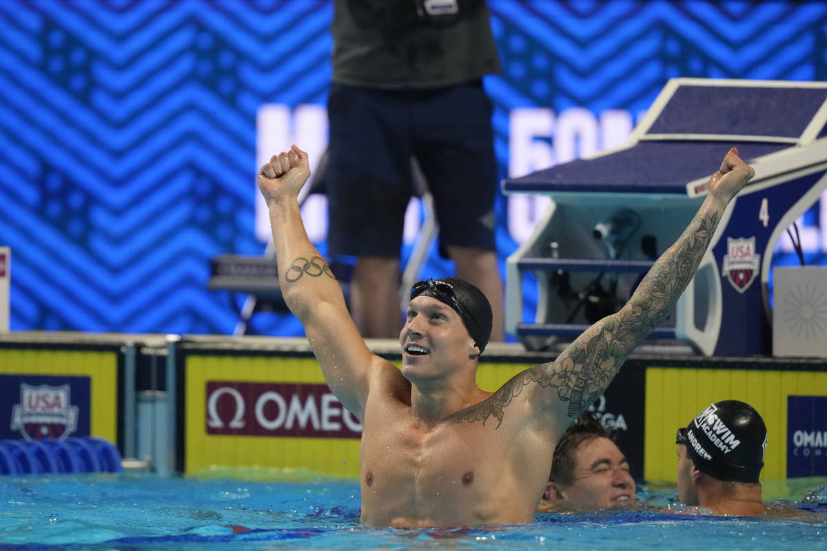 Caeleb Dressel reacts after winning the men's 50-meter freestyle final during wave 2 of the U.S ...