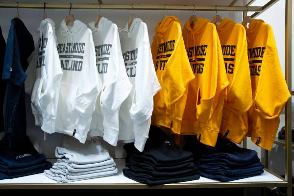 Sweatshirts and sweatpants are for sale at the opening of Beast Mode, NFL running back Marshawn ...