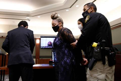 Cadesha Bishop is taken into custody after her bail hearing at the Regional Justice Center in L ...