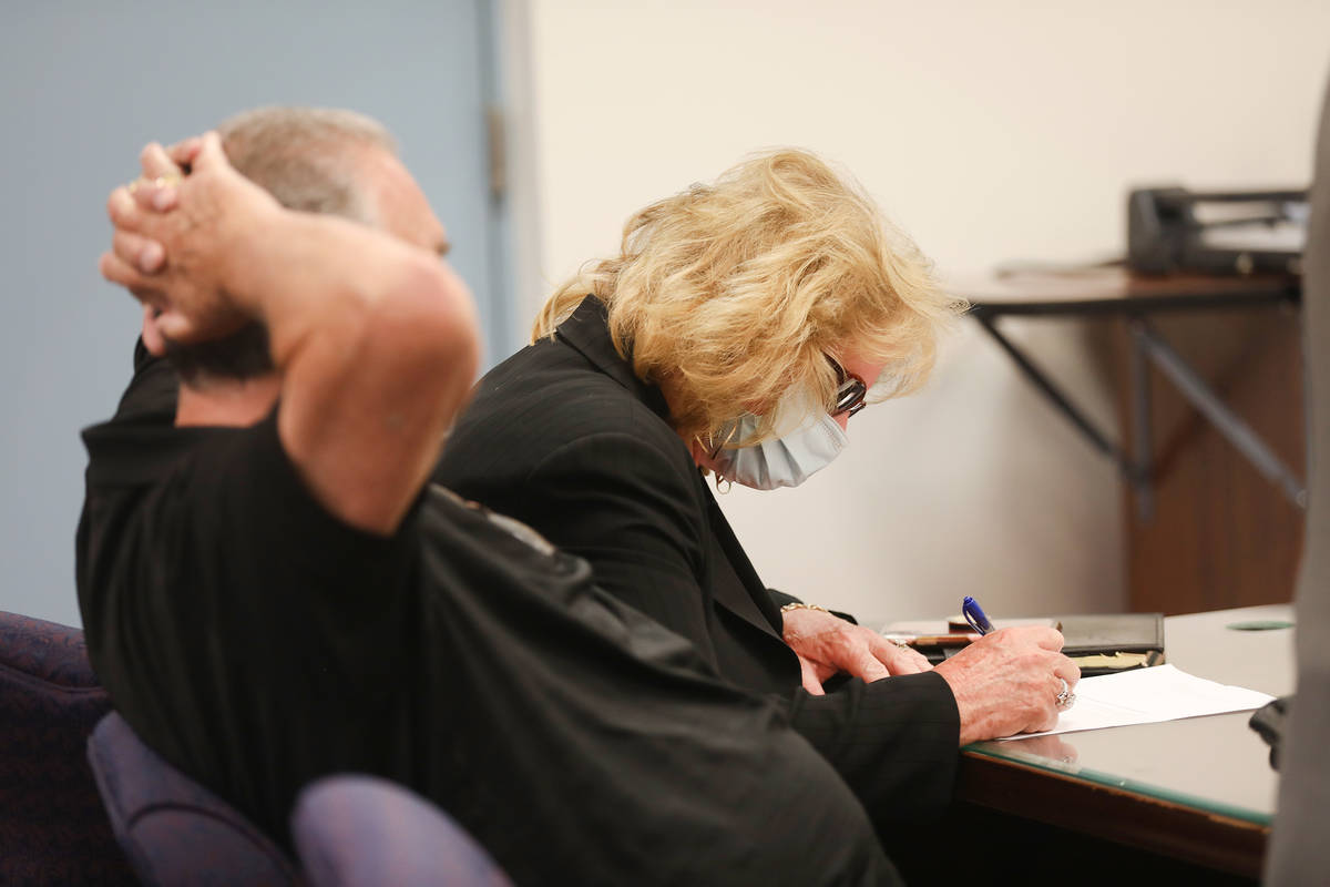 Patricia Chappuis, seated beside her husband and co-defendant in a massive child abuse case, si ...
