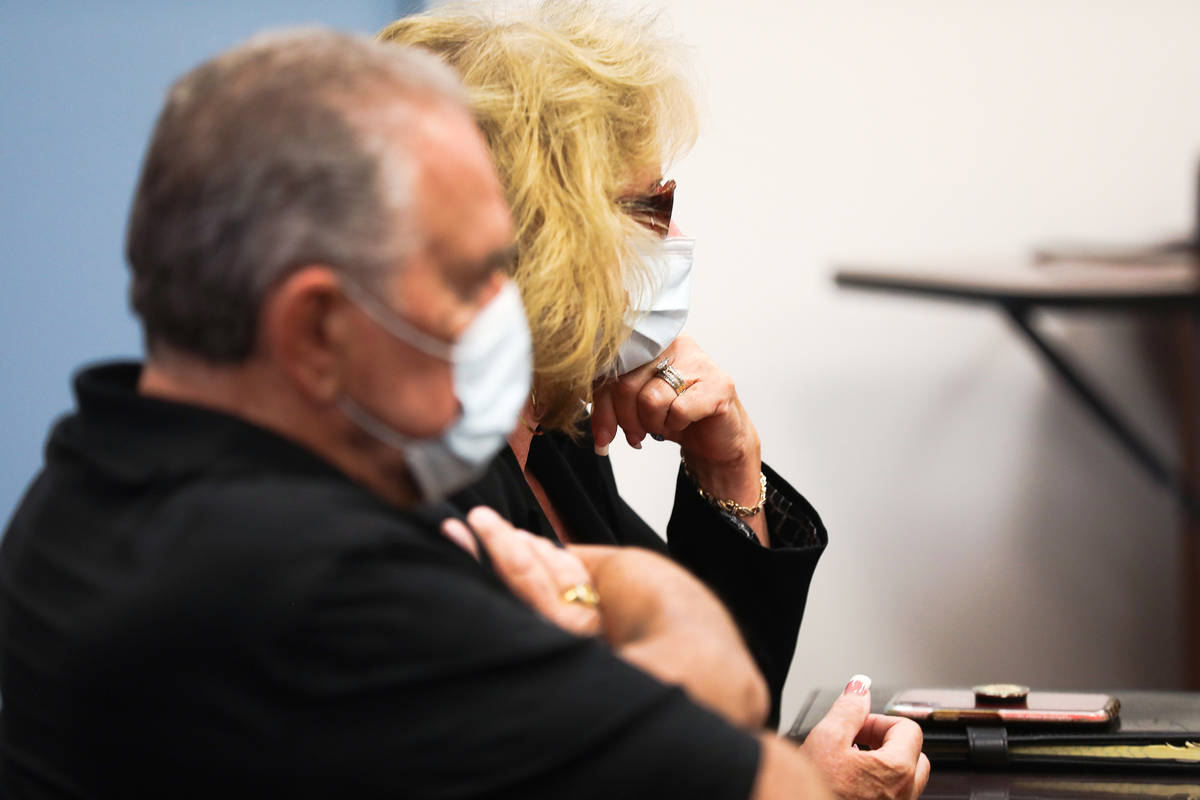 Patricia Chappuis and her husband, Marcel, listen to the judge during a hearing at Beatty Justi ...
