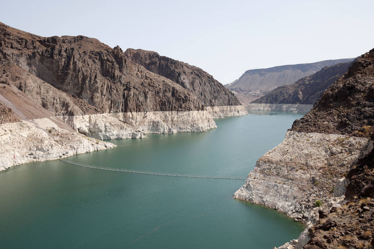 A bathtub ring of light minerals shows the high water line near Hoover Dam on Lake Mead from th ...
