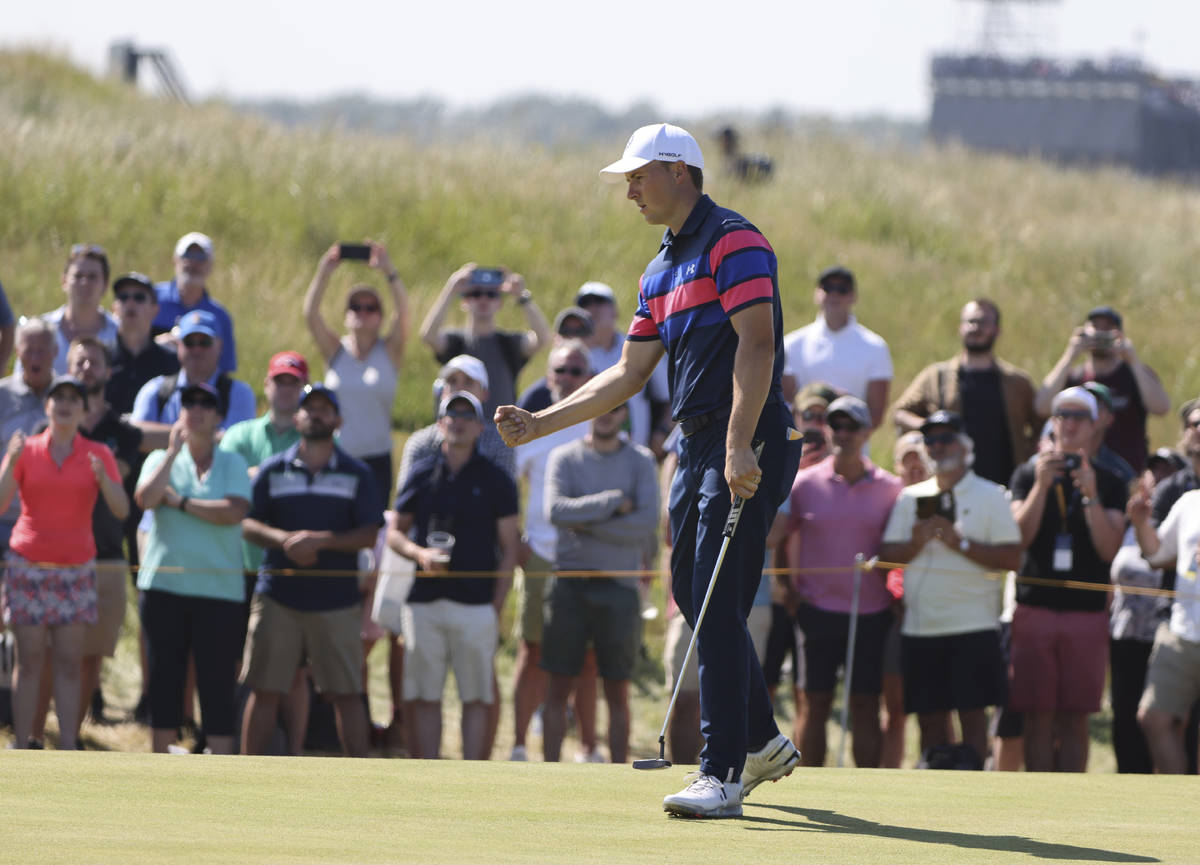United States' Jordan Spieth celebrates an eagle on the 7th green during the final round of the ...