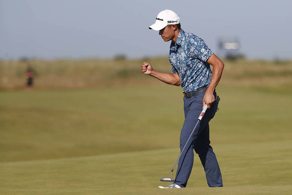 United States' Collin Morikawa celebrates after a birdie putt on the 14th hole during the final ...