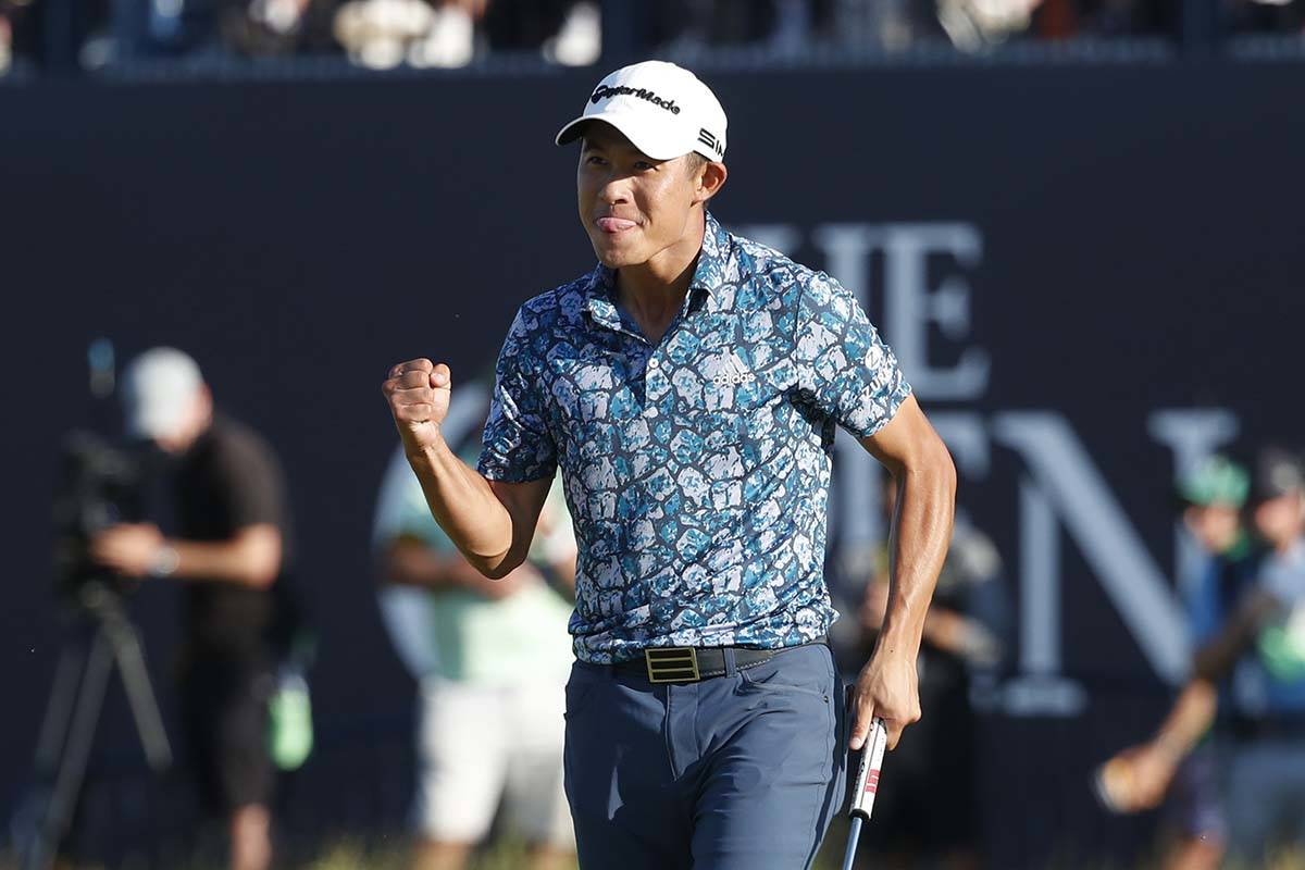 United States' Collin Morikawa celebrates on the 18th green after winning the British Open Golf ...
