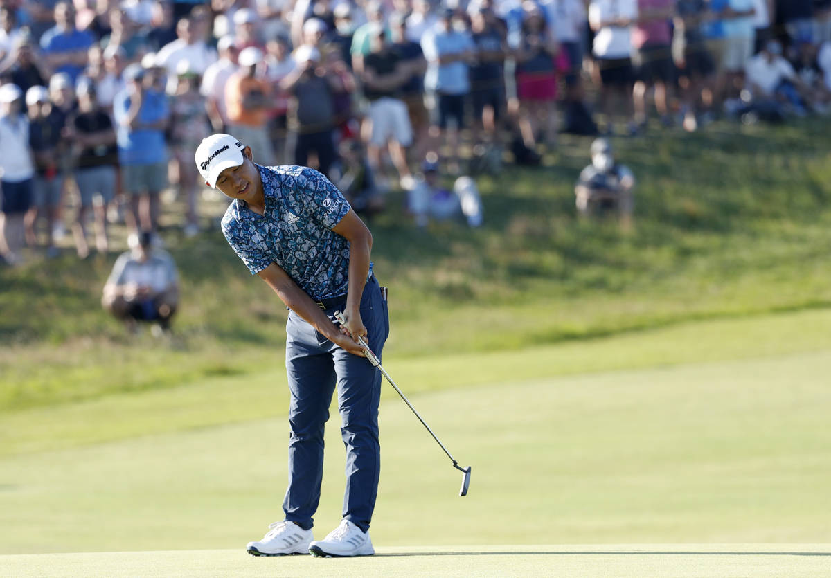 United States' Collin Morikawa reacts after missing a birdie chance on the 17th green during th ...