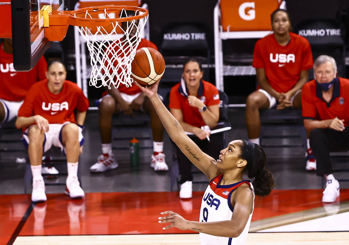 United States forward A'ja Wilson lays up the ball during the first half of an exhibition baske ...