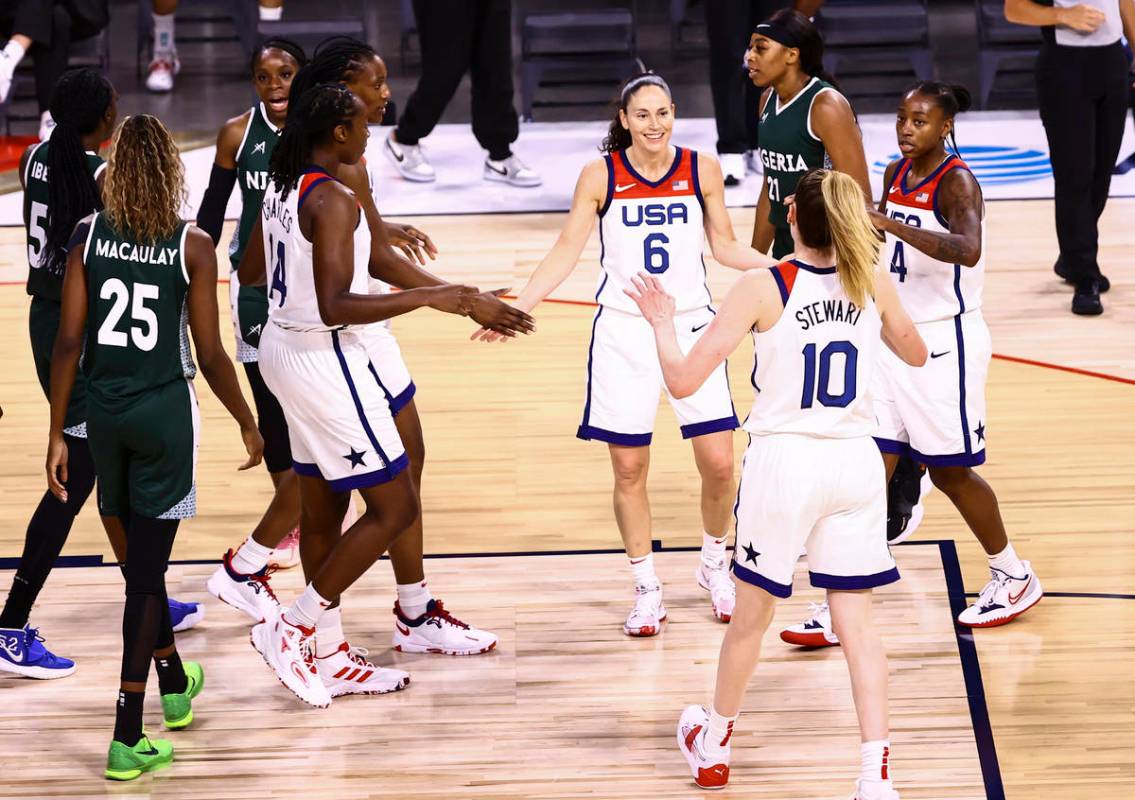 United States guards Sue Bird (6) and Jewell Loyd (4) gather with teammates during a break whil ...