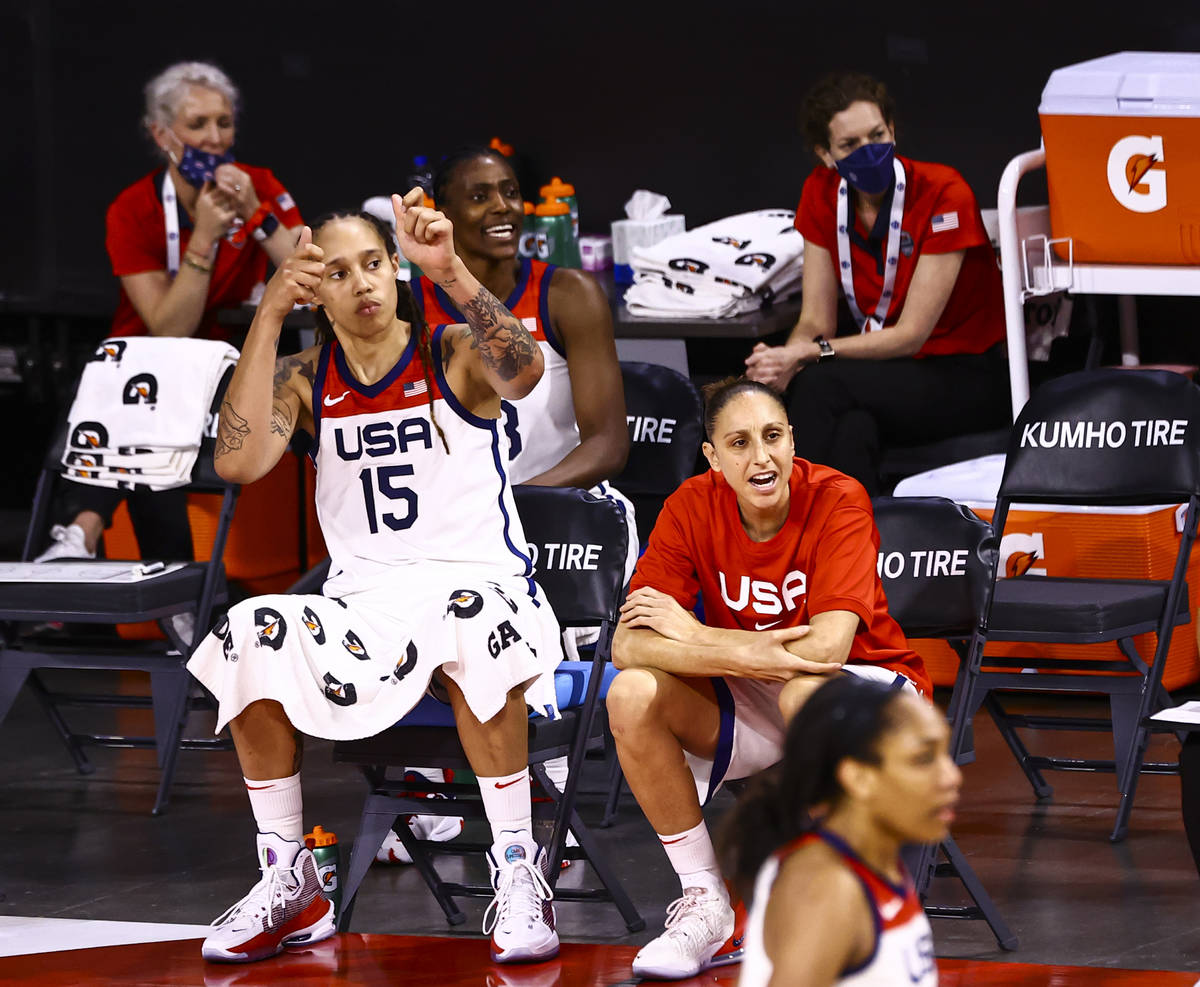 United States center Brittney Griner (15) and guard Diana Taurasi, right watch the action durin ...