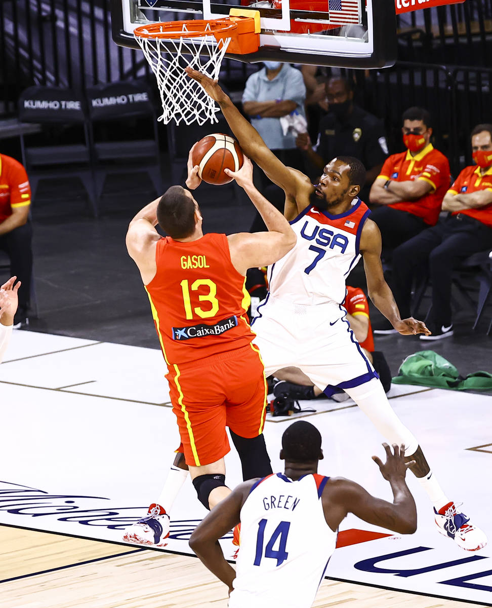 United States forward Kevin Durant (7) blocks Spain center Marc Gasol (13) during the first hal ...