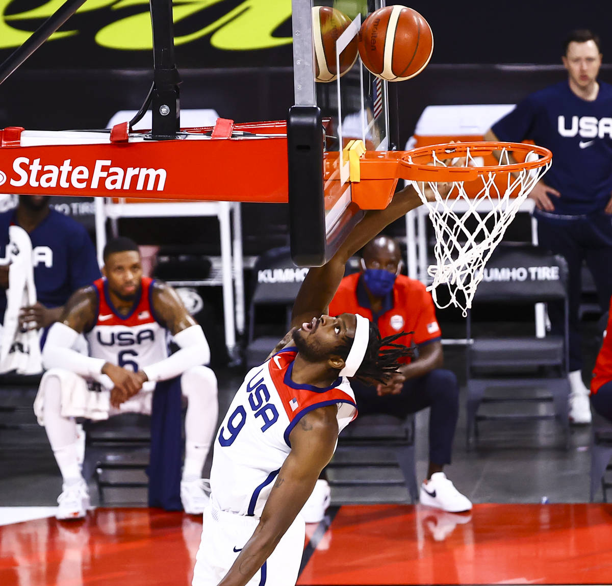 United States forward Jerami Grant (9) lays up the ball against Spain during the first half of ...