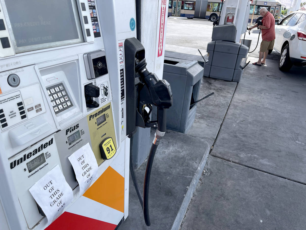 Ken Humphrey of Las Vegas gets premium gas as regular and plus grades are empty at the Circle K ...