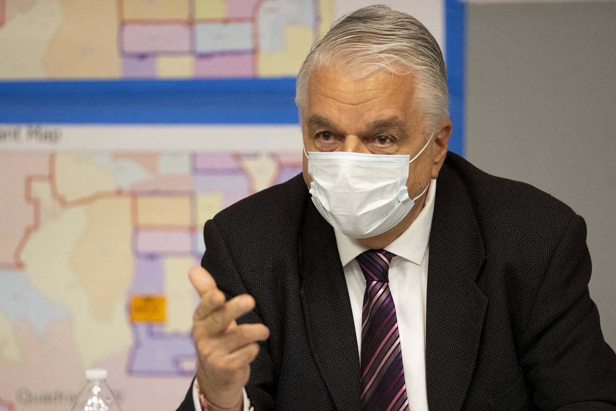 Nevada Governor Steve Sisolak speaks during a briefing on the COVID-19 surge and response, with ...