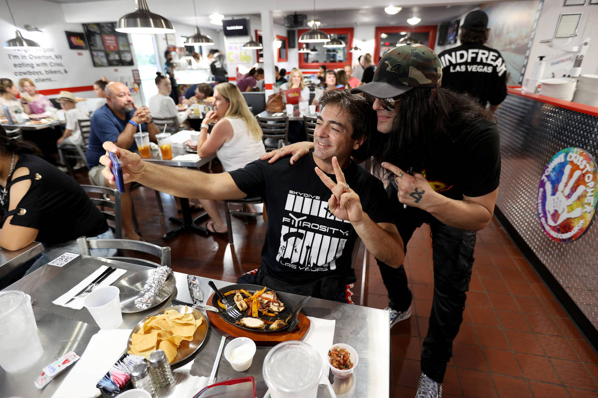 Criss Angel, right, poses with Sammy Vassilev at his new restaurant, CABLP, in Overton during t ...