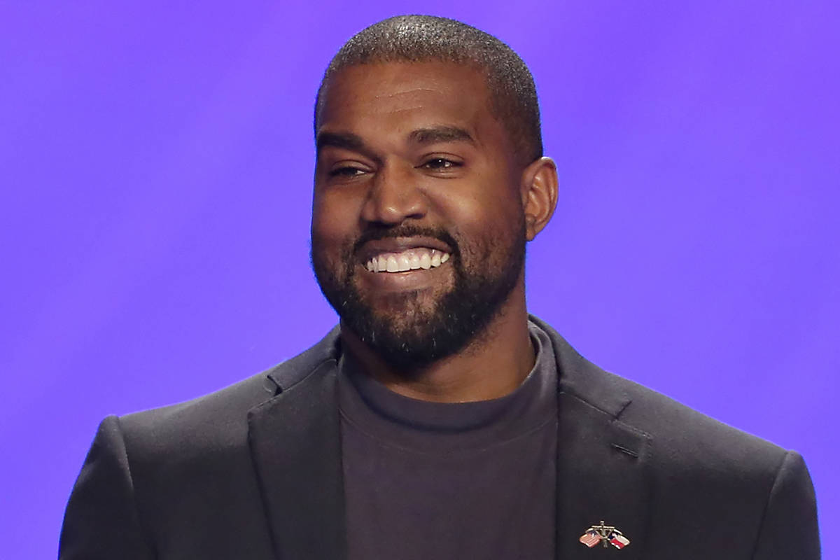 FILE - In this Nov. 17, 2019, file photo, Kanye West appears on stage during a service at Lakew ...