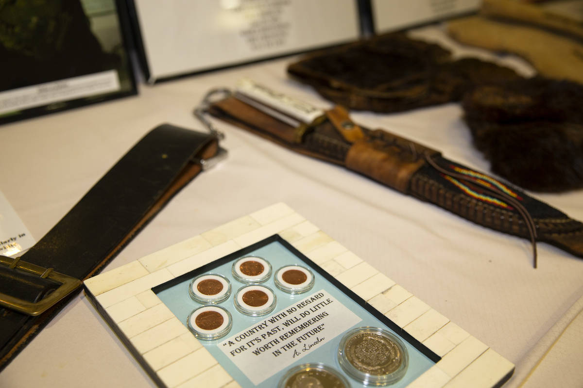 Antiques and memorabilia are displayed during an event for Buffalo Soldiers Day at Culinary Aca ...