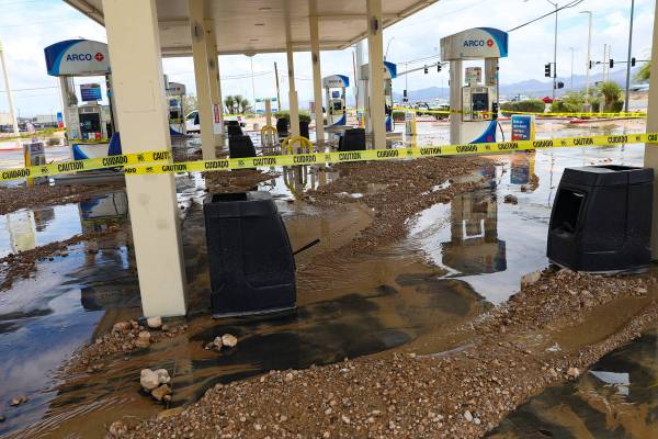 An Arco gas station is washed out from a recent flash food near Rainbow Boulevard and Blue Diam ...