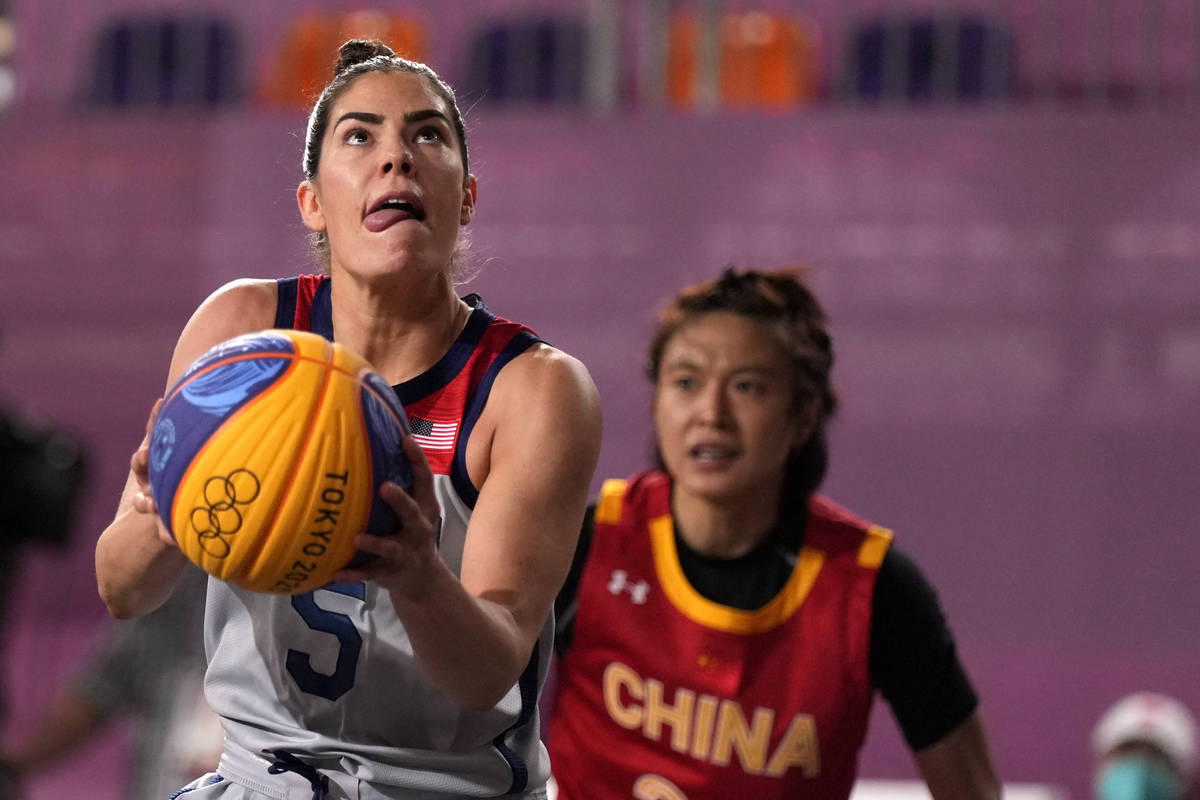 Kelsey Plum, of the United States, shoots during a women's 3-on-3 basketball game against China ...
