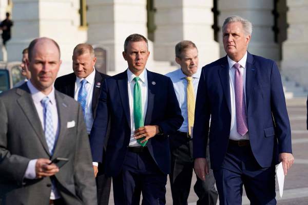 House Minority Leader Kevin McCarthy, R-Calif., right, and other Republican House members, walk ...