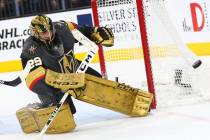 Golden Knights goaltender Marc-Andre Fleury (29) blocks a shot from the Arizona Coyotes during ...