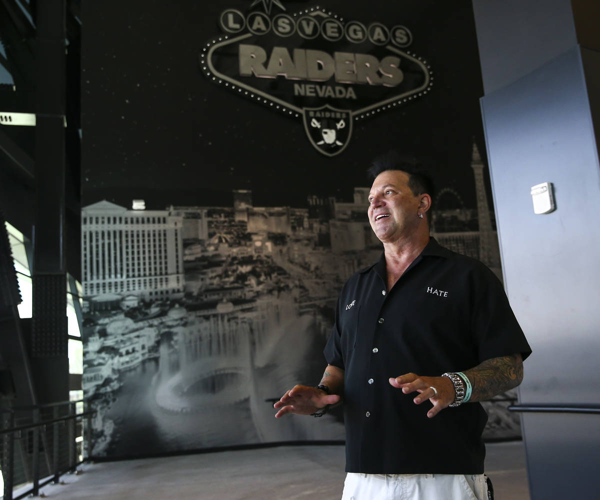 Artist Michael Godard, who curated the Allegiant Stadium art collection, talks about the curati ...