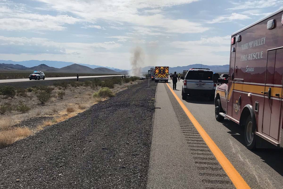 Nye County officials respond to a "downed aircraft" on U.S. Highway 95 on Wednesday, July 28, 2 ...