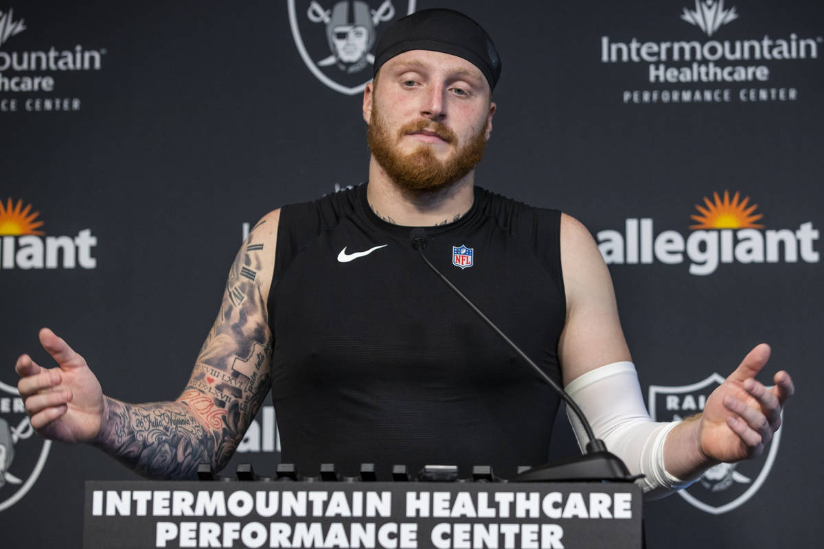 Raiders defensive end Maxx Crosby (98) speaks during a press conference following the first pra ...