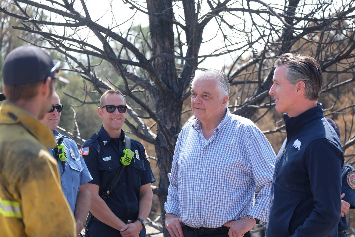 Govs. Sisolak and Newsom speak to fire personnel involved in battling the Tamarack Fire, which ...