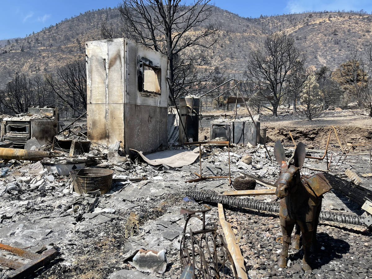 Remains of destroyed home consumed by the Tamarack Fire in Gardnerville, NV. July 28, 2021. (Bi ...