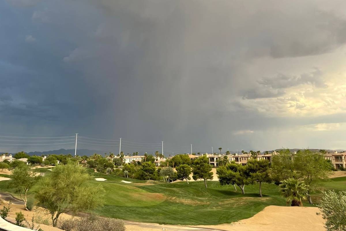 A storm moves into Las Vegas, as seen from the far western valley, on Thursday. (Belinda Englma ...