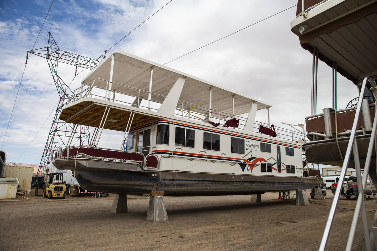 Dry-docked houseboats, which can no longer be launched at the last remaining launch ramp at the ...