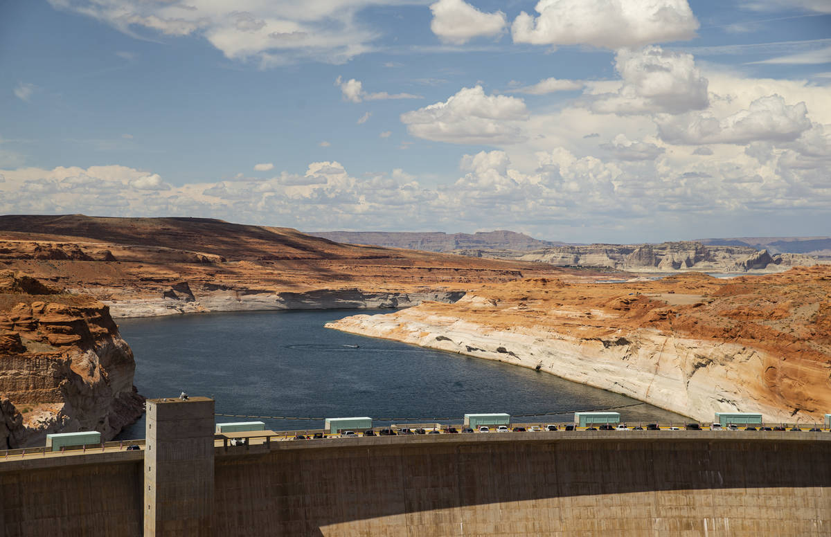 A view of Lake Powell and the Glen Canyon Dam in the Glen Canyon National Recreation Area on Tu ...