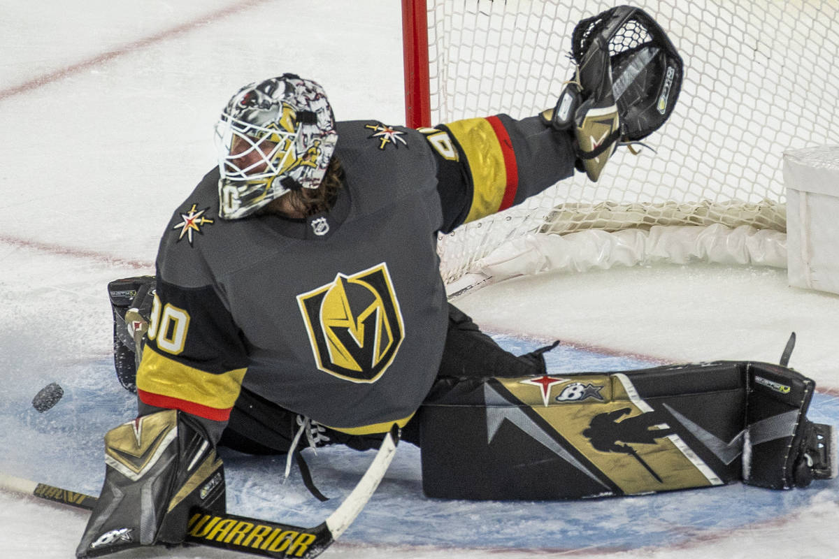 Minnesota Wild center Victor Rask (49) takes a shot of Golden Knights goaltender Robin Lehner ( ...