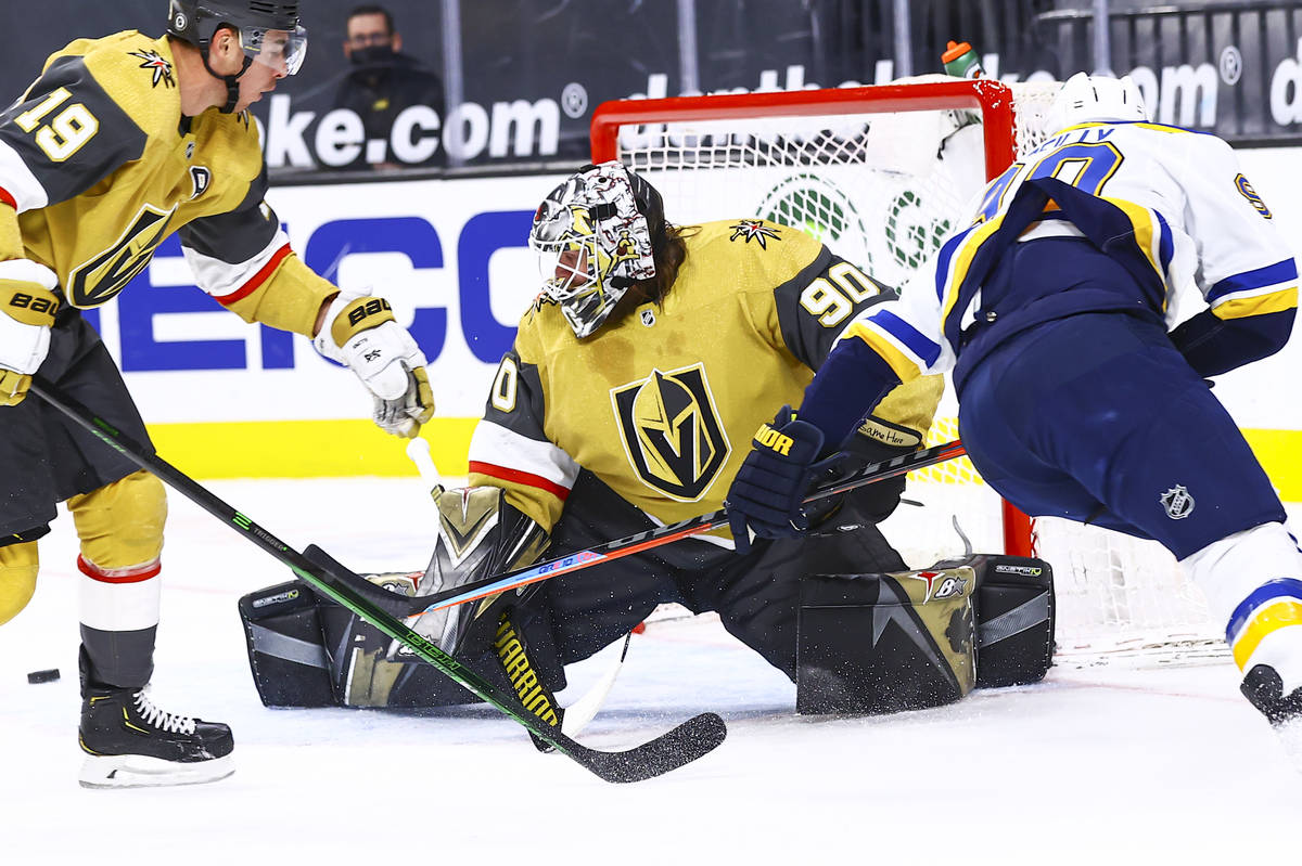 Golden Knights goaltender Robin Lehner (90) blocks a shot from St. Louis Blues' Ryan O'Reilly, ...