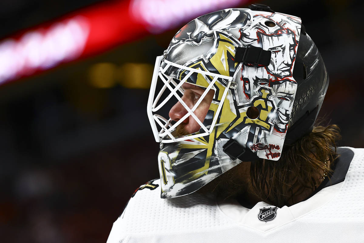 Golden Knights goaltender Robin Lehner (90) looks on during a break the second period of an NHL ...