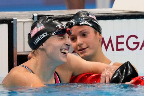 Katie Ledecky, of United States, celebrates with teammate and Las Vegas native Katie Grimes aft ...
