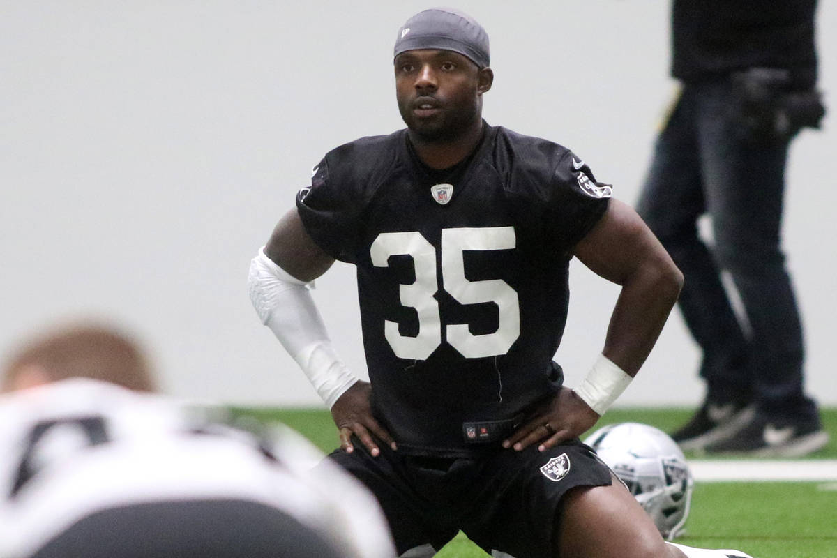 Las Vegas Raiders running back Theo Riddick (35) stretches during a practice session at the tea ...