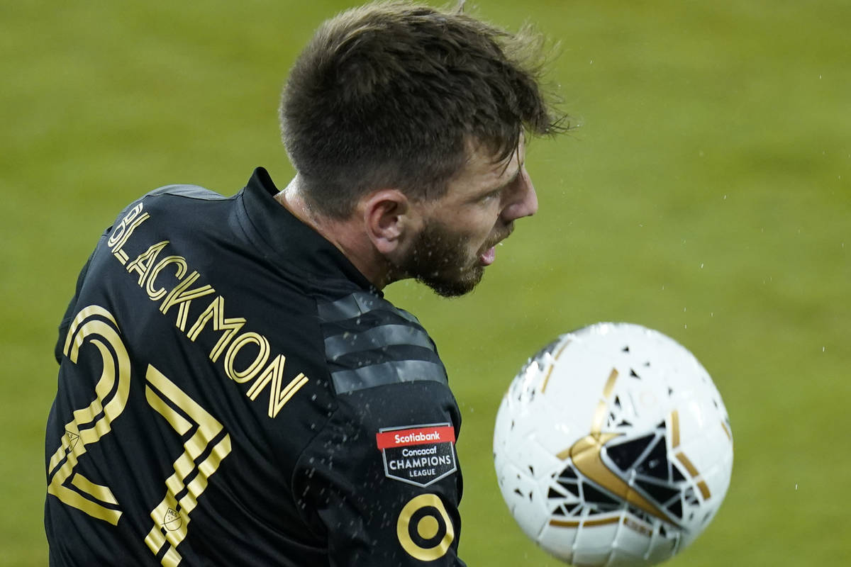 Los Angeles FC defender Tristan Blackmon (27) gets position on the ball in front of Tigres midf ...