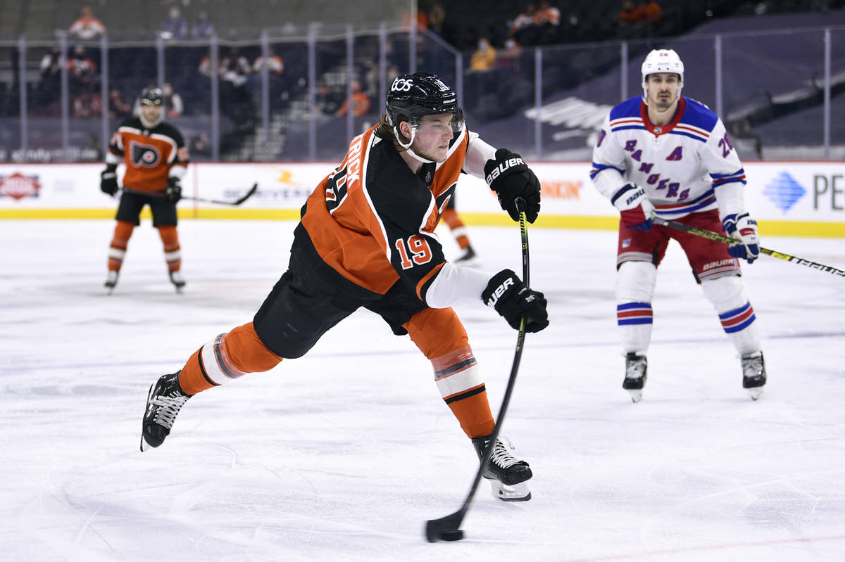 In this Saturday, March 27, 2021 file photo, Philadelphia Flyers' Nolan Patrick takes a shot on ...