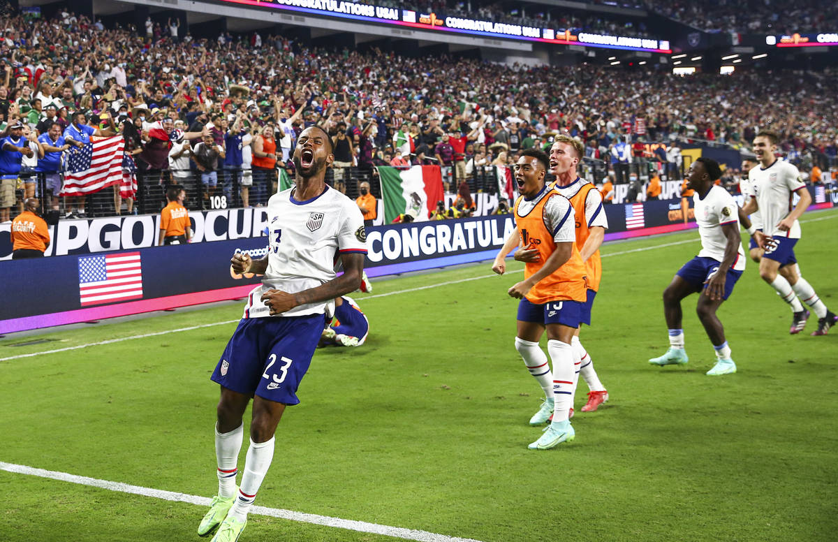 United States players celebrate after defeating Mexico 1-0 in extra time to win the Concacaf Go ...