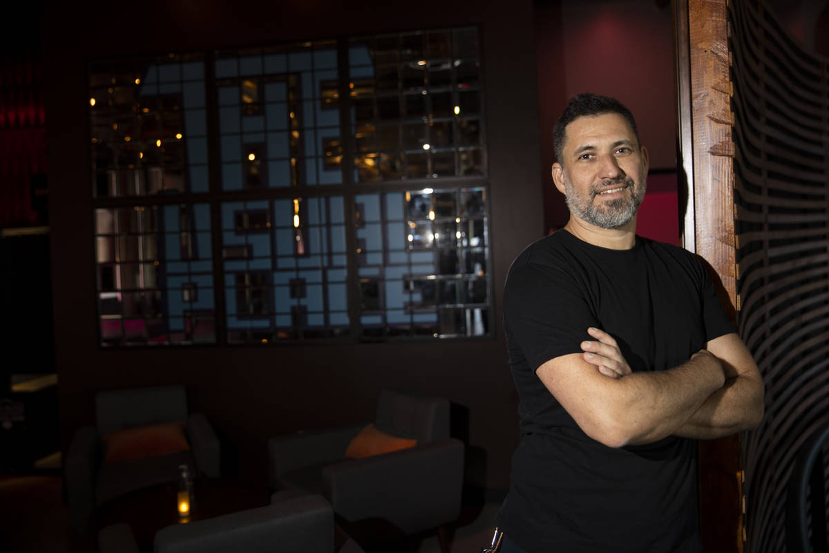 Bar manager Carlos Sanchez poses for a portrait at The Usual Place music venue in Las Vegas, Fr ...