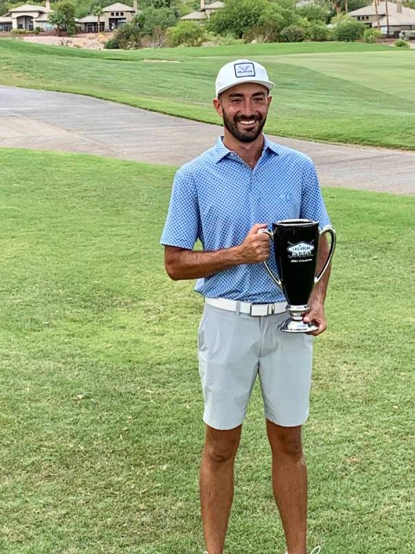 Marty Sanchez displays the trophy on the 18th hole of TPC Las Vegas after winning the inaugural ...