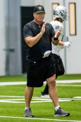 Raiders Head Coach Jon Gruden encourages his players during practice at the Intermountain Healt ...