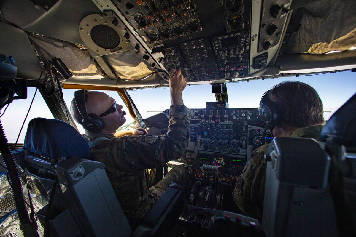 Captains Chase Cooper, left, and Jessica Rothmeier, of the 350th Air Refueling Squadron, fly a ...