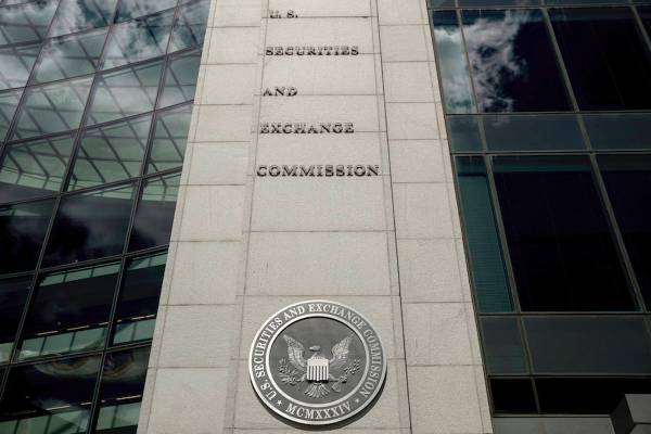 In this Aug. 5, 2017, file photo U.S. Securities and Exchange Commission building in Washington ...