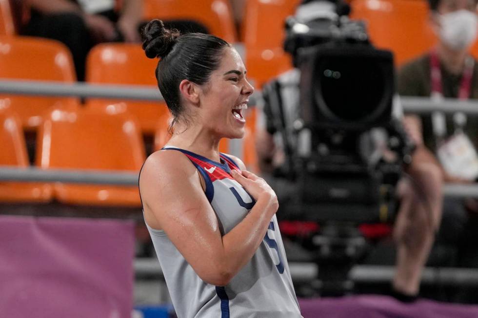 United States' Kelsey Plum celebrates victory over Russian Olympic Committee in a women's 3-on- ...
