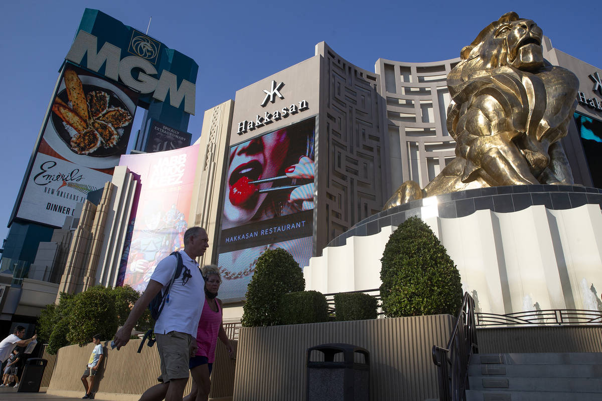 Visitors to the Las Vegas Strip pass MGM Grand on Wednesday, Aug. 4, 2021. Caesars Entertainmen ...