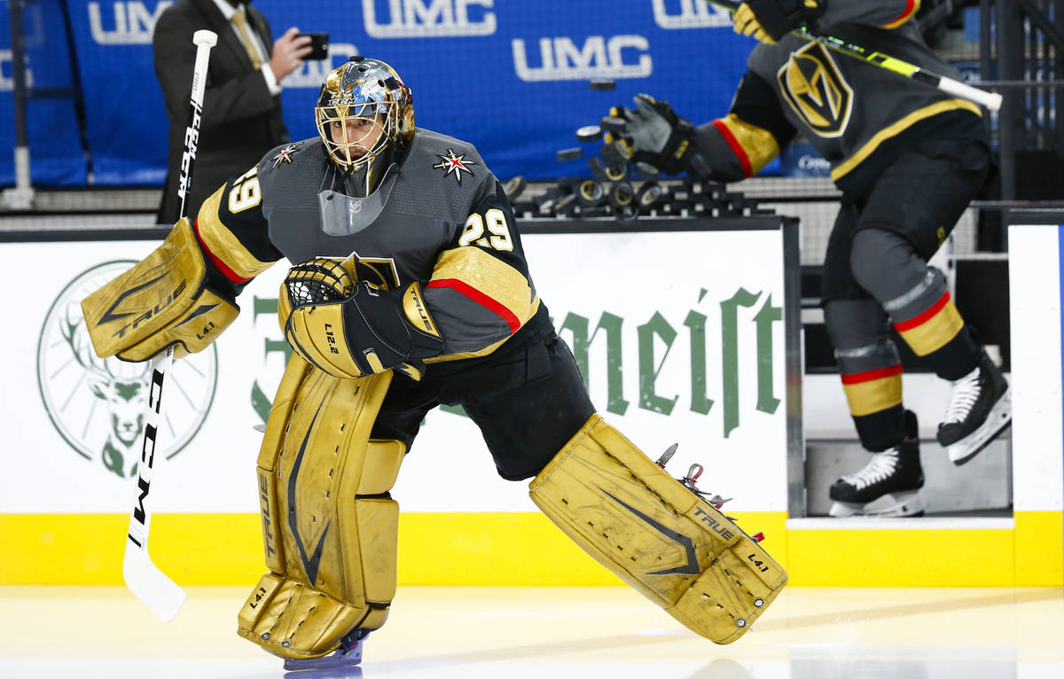 Golden Knights goaltender Marc-Andre Fleury warms up before the start of Game 5 of a first-roun ...